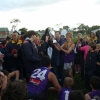 Captain Toby Bell with the coaches receiving the premiership cup.