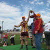 Reserves capt. Nathan Lawless and Coach Paul Sidebottom holding the cup aloft.