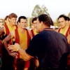 Coach Allan Grumpy Smith with L-R Shane Batty(arms crossed), Troy Dickson, Wayne Dover( back-hands on hips curly mullet!), Darren Terlich(hands on hips), Todd Hutchen(black hair on grumpys right), Pittsy showing his teeth, and Damien Condon with water b