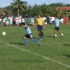 Iakina player dribbles by referee