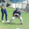 Catching Coach Louis Solaita giving instruction