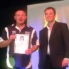 Grant O'Leary, Cats, accepts the Cats Quality Club Program Award from Andrew Knott AFL NSW/ACT