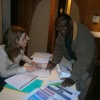 Celine of Olympic Solidarity at the registration desk