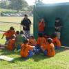 The Under 13s take a break and listen to coach Pedro Ramos