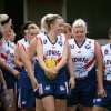 Enter Central Districts Women's Football Club, led onto the field for their first game by Inaugural Captain, Emma Gibson