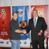 Steve Clancy of Bowral United Soccer Club recieves AA Women Div. 2 Minor Premiers shield