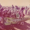 St Joseph's Junior Soccer Club banner and players 