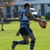 Brent Flannery drives the ball up forward.