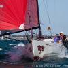 Tigris powering along under their big red spinnaker, but it wasn’t always so pretty for them…