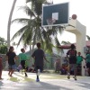Fast break pace in the opening game of the MIBF/SEP/MOH summer basketball league. Photo: Hilary Hosia