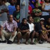 Top basketball fan Finance Minister Brenson Wase (left seated) enjoying Constitution Day basketball action.