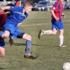 BV United player Tom Downes gets airborne in pursuit of the ball during the Knockout Cup final