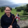 Sarah Wallace holds the burgee on the grounds of Wray Castle, Lakes District UK