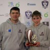 Under-12 interleague coach Glynn Whateley presents the U12 best-and-fairest award to Glengarry's Sam Schutte