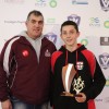 Under-14 interleague coach Rick Galea presents the U14 best-and-fairest award to Pax Hill's Cody MacDonald
