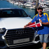 Congratulations to Danny Trainor who is holding the burgee next to the brand new Audi he won at Hamilton Island Race Week.