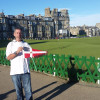 Danny Trainor holds the burgee at the home of Golf - St Andrews, Scotland (standing at the first tee).
