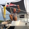 Mike Vanderwarker with the burgee on Tramp, a Seahorse 52ft powerboat. 