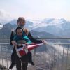 atherine and James Borazio hold the Burgee on Mt Titlis in the Uri Alps, Switzerland