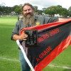 Presentations to the Premiers prior to the first game of the season. President, Stephen Finch with the flag and plaque