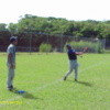 Outfield coach Clayton hitting fungos
