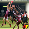 A pack forms for the ball in this Queensland v NT match.