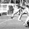 Brett Wales on the flank for Wee Waa, pursued by Colin Pratt and Trevor Mitchell of Tamworth.  Photo dated 15/05/1990, courtesy of the Northern Daily Leader.