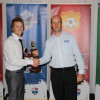 Trevor Dinham recieves AA Men Div.1 Player of the Year award from Nick D'Amore
