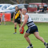 Ian Kay looks to rebound the ball from the defensive 50.