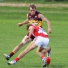 Mount Compass captain Nick Brokenshire sizes up a Strathalbyn opponent