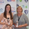 15-and-under best-and-fairest runner-up Taylah Brown (Leongatha) and Wonthaggi Power coach Carmel Birkett accepting the winner's trophy on behalf of Eva Lindsay.