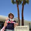 Ann Goodwin holds the burgee outside the Palm Springs Art Museum (Architecture & Design Center)