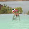 Anne Gibson with her burgee in the infinity pool pool, Lake Argyle, The Kimberlies