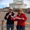 David and Anna Farr with the burgee at Senate Square, Helsinki, Finland