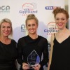 Gippsland Cosmetic Laser Clinic A grade Netball Player of the Year Award winner Stacey O'Brien of Traralgon. Award presented by Loretta Molino (left) and Heidi Pearce (right)