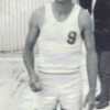 Founding Member Jock Dean 1968, wearing original uniform - dyed yellow singlet and shorts