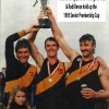 Alan Jennings, Shane Hollingsworth, and Rudy Bence hold up the Premiership cup